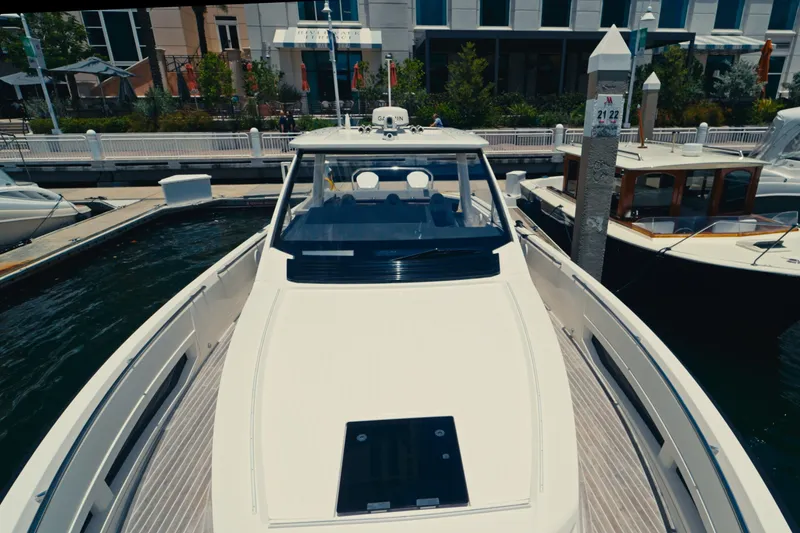 Slide: The Image of 2022 Windy SR44 yacht docked at marina, showcasing sleek design and modern features. - 5