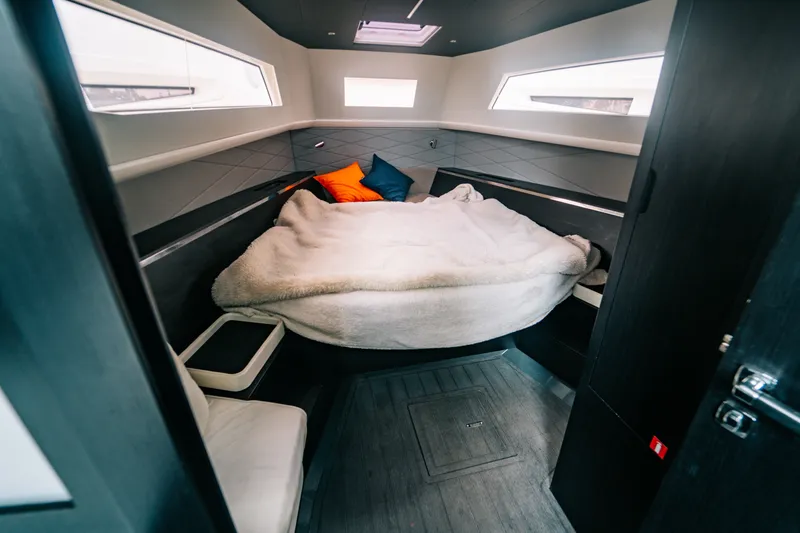 Slide: The Image of Luxurious cabin interior of 2022 Windy SR44 yacht with cozy bedding and modern design. - 25