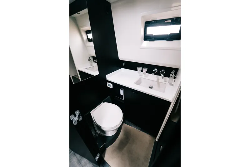 Slide: The Image of Luxurious bathroom interior of 2022 Windy SR44 yacht with modern fixtures and sleek design. - 21