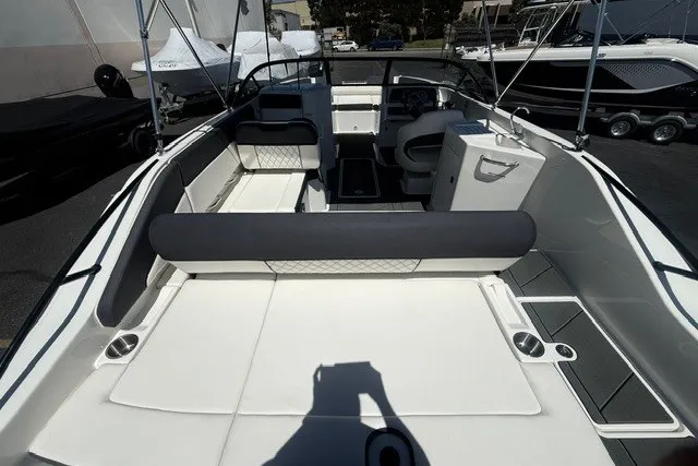Slide: The Image of 2026 Bayliner D22 boat interior with spacious seating and modern design. - 18
