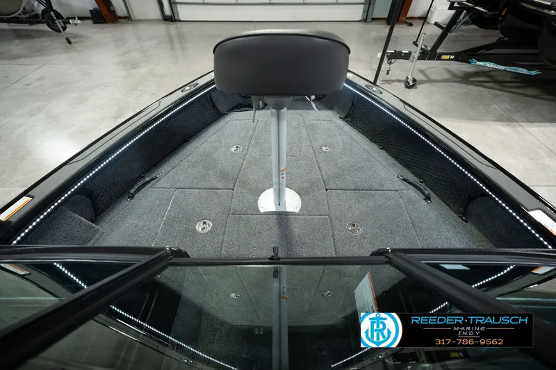 Slide: The Image of Interior view of 2026 Lund 1975 Pro-V Sport boat with seating and storage. - 21