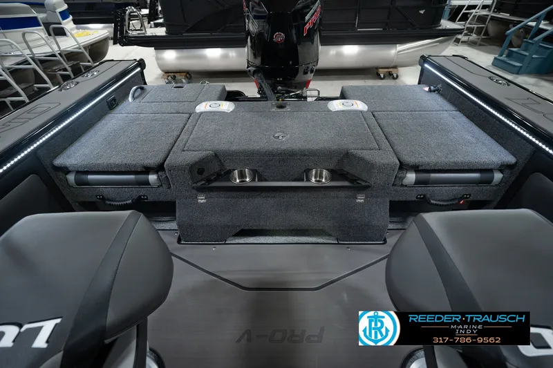 Slide: The Image of 2026 Lund 1975 Pro-V Sport boat interior with seating and storage compartments. - 26