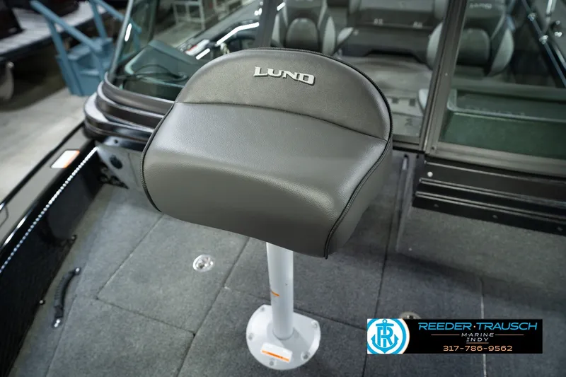 Slide: The Image of Lund 1975 Pro-V Sport boat seat, 2026 model, in a sleek interior setting. - 50