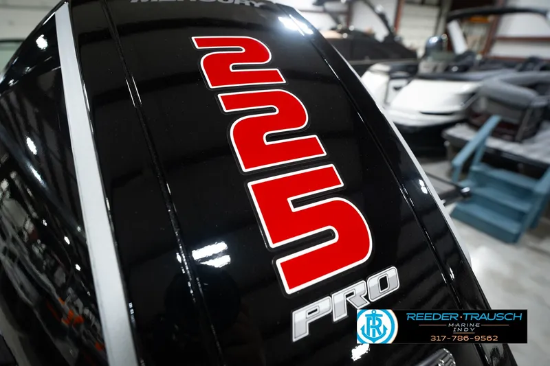 Slide: The Image of Close-up of a Mercury 225 Pro engine on a 2026 Lund 1975 Pro-V Sport boat. - 59
