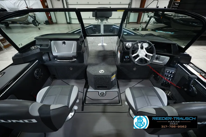 Slide: The Image of Interior of 2026 Lund 1975 Pro-V Sport boat with modern dashboard and seating. - 20