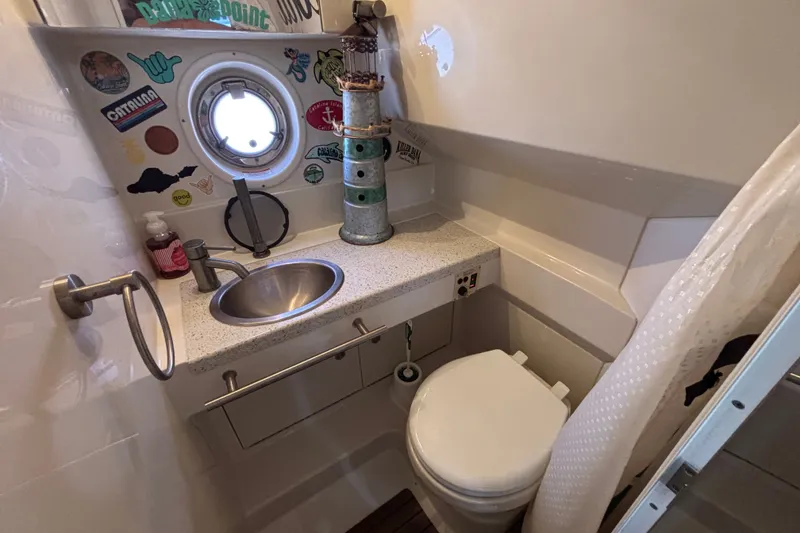 Slide: The Image of Bathroom interior of 2013 Sea Ray Sundancer 310 yacht with sink and toilet. - 30