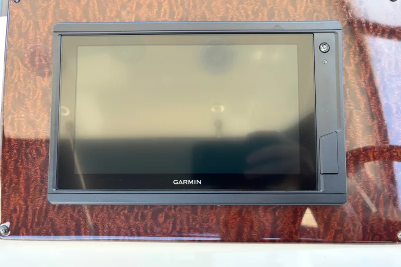 Slide: The Image of Garmin navigation display on 2013 Sea Ray Sundancer 310 boat dashboard. - 16