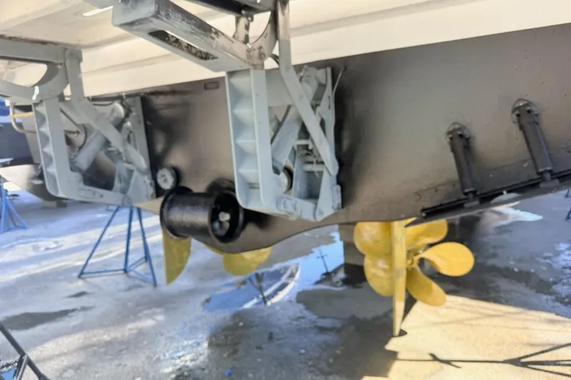 Slide: The Image of 2018 Azimut 66 Flybridge yacht propeller and rudder system in dry dock. - 54