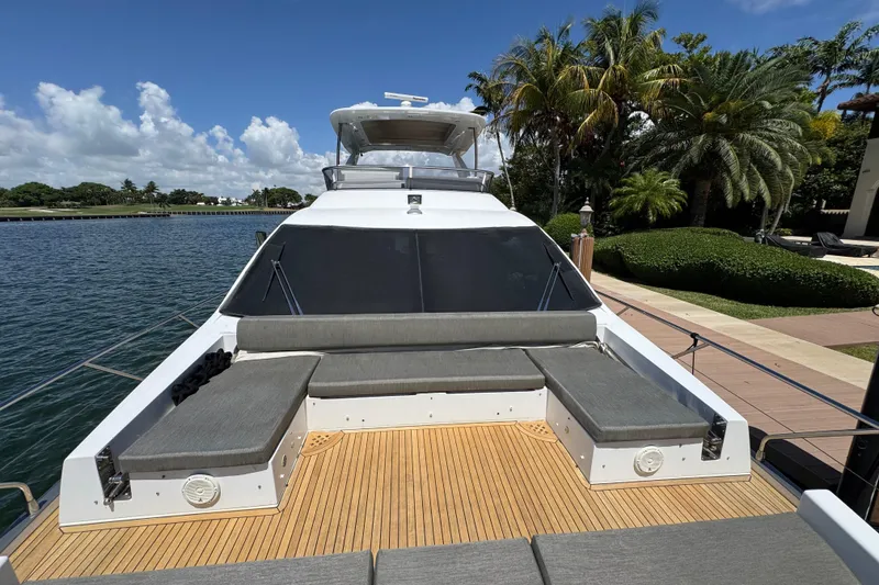 Slide: The Image of Luxurious 2018 Azimut 66 Flybridge yacht with spacious deck and elegant seating. - 6