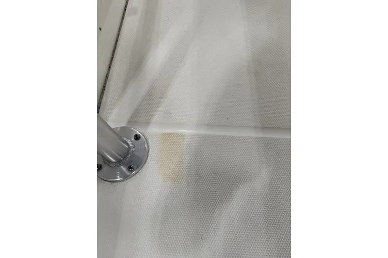 Slide: The Image of Close-up of 2015 Boston Whaler 210 Montauk boat deck with metal fixture. - 23