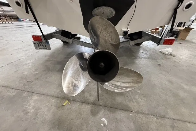 Slide: The Image of Propeller of a 2015 Boston Whaler 210 Montauk boat on a trailer. - 22