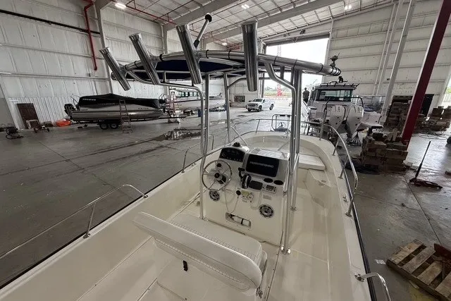 Slide: The Image of 2015 Boston Whaler 210 Montauk boat in a spacious indoor storage facility. - 6