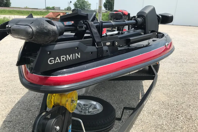 Slide: The Image of 2024 Ranger Z185 boat with Garmin equipment, parked on a trailer in a sunny outdoor setting. - 4