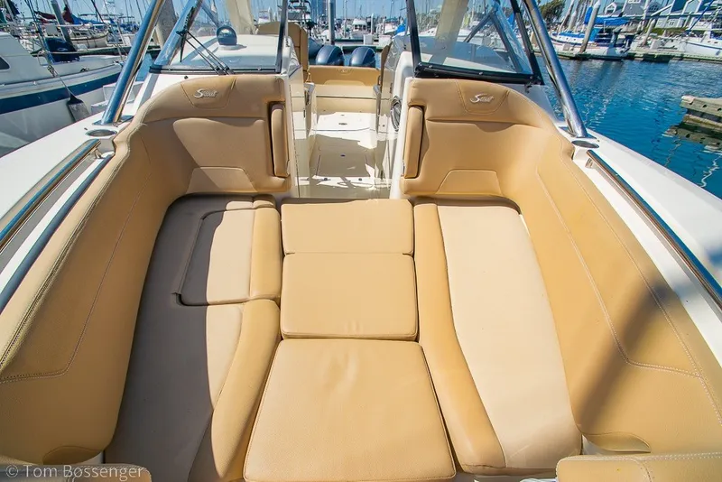 Slide: The Image of Luxurious seating area on a 2017 Scout 275 Dorado boat at a marina. - 23