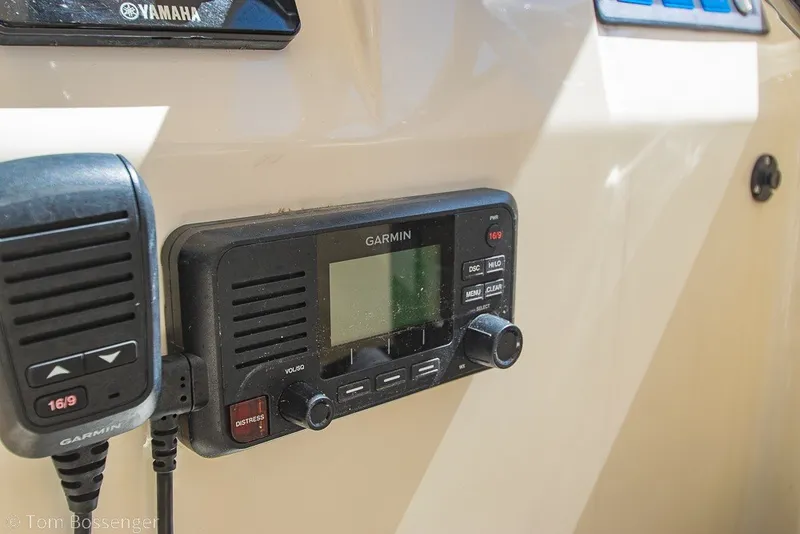 Slide: The Image of Garmin marine radio on 2017 Scout 275 Dorado boat dashboard. - 35