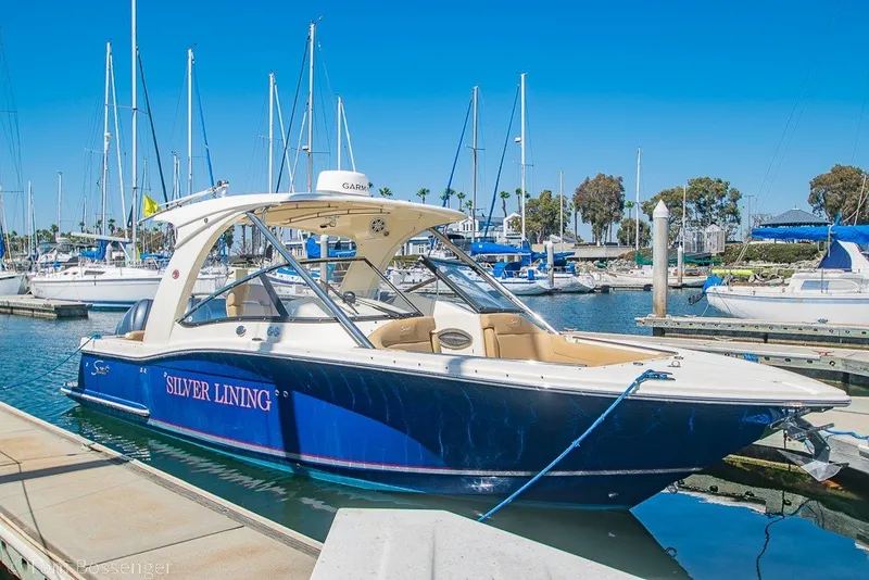The Image of 2017 Scout 275 Dorado boat named "Silver Lining" docked in a marina. - 0