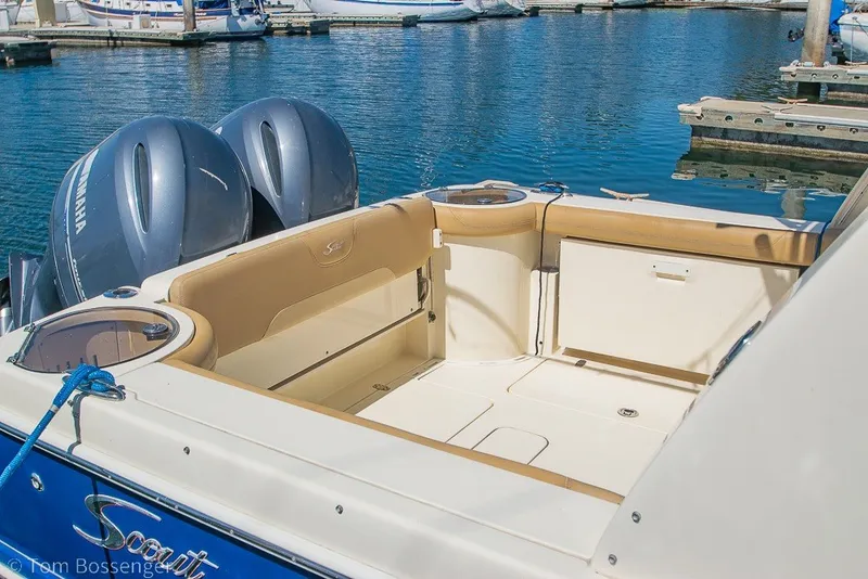 Slide: The Image of 2017 Scout 275 Dorado boat with dual Yamaha engines docked at marina. - 12