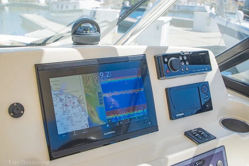 Slide: The Image of Dashboard of a 2017 Scout 275 Dorado boat with Garmin navigation system. - 32