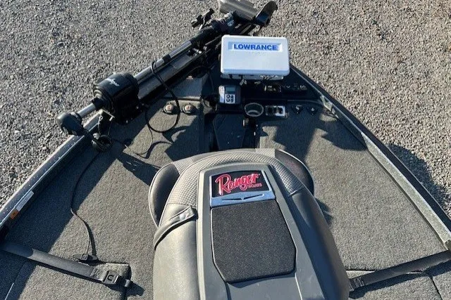 Slide: The Image of 2024 Ranger Z521R boat deck with Lowrance electronics and trolling motor. - 2