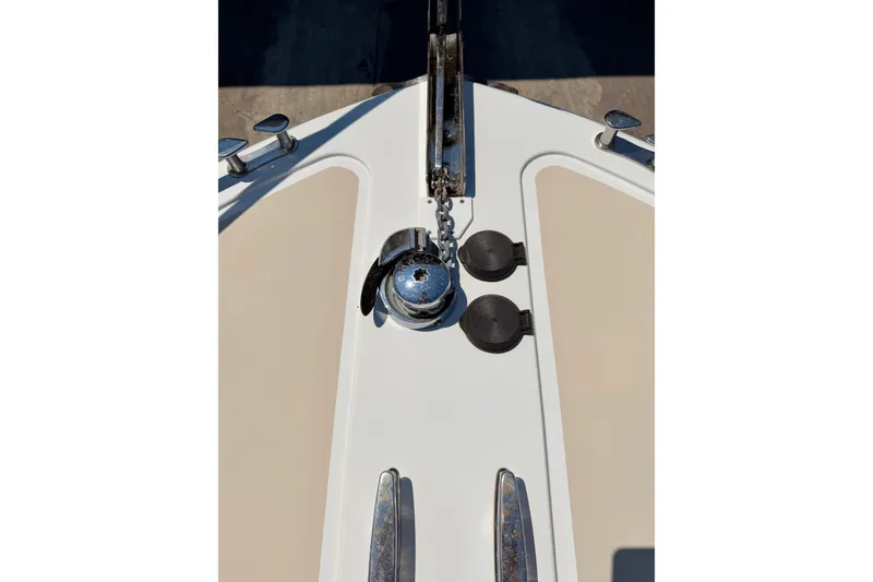 Slide: The Image of Bow of 2009 MJM 29z Downeast boat with anchor chain and cleats. - 25