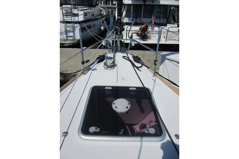 Slide: The Image of 2013 Jeanneau Sun Odyssey 469 yacht deck with hatch and rigging details. - 44