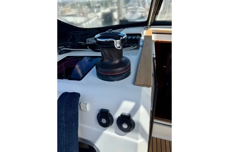 Slide: The Image of Winch and controls on 2013 Jeanneau Sun Odyssey 469 sailboat deck. - 34