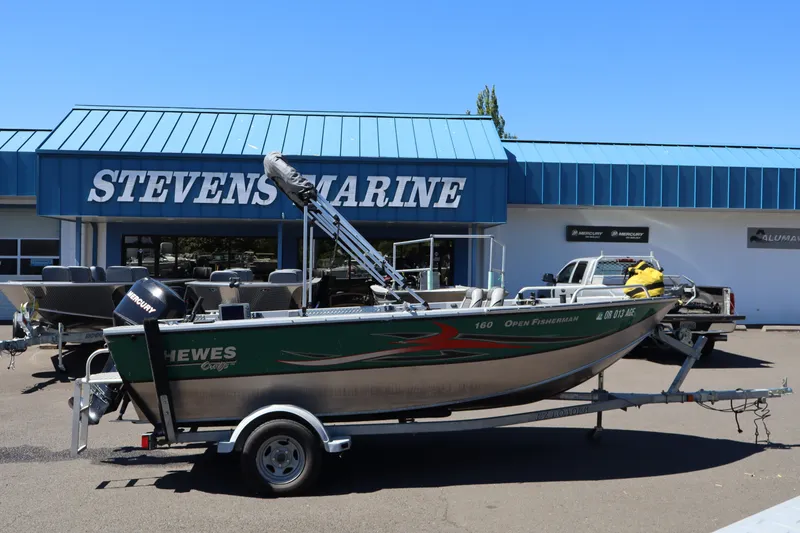 The Image of 2007 Hewescraft 160 Open Fisherman boat on trailer at Stevens Marine dealership. - 1