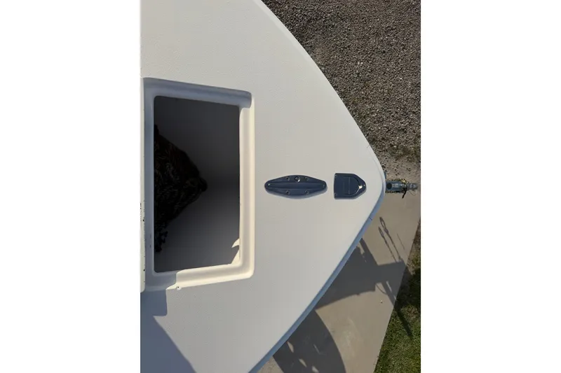 Slide: The Image of Bow of a 2002 Silverhawk 240 Center Console boat with anchor storage. - 33