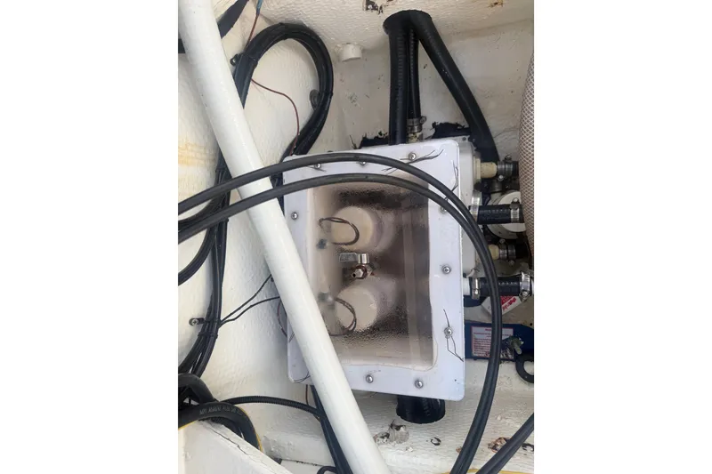 Slide: The Image of Electrical wiring and components inside a 2002 Silverhawk 240 Center Console boat. - 36