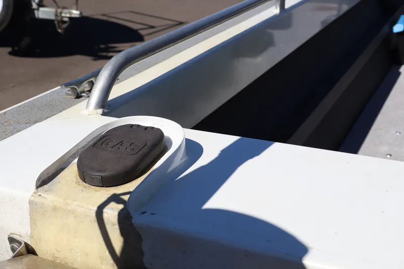 Slide: The Image of Gas cap on a 2007 Tacoma Jet 17' Mechanic's Special boat. - 8