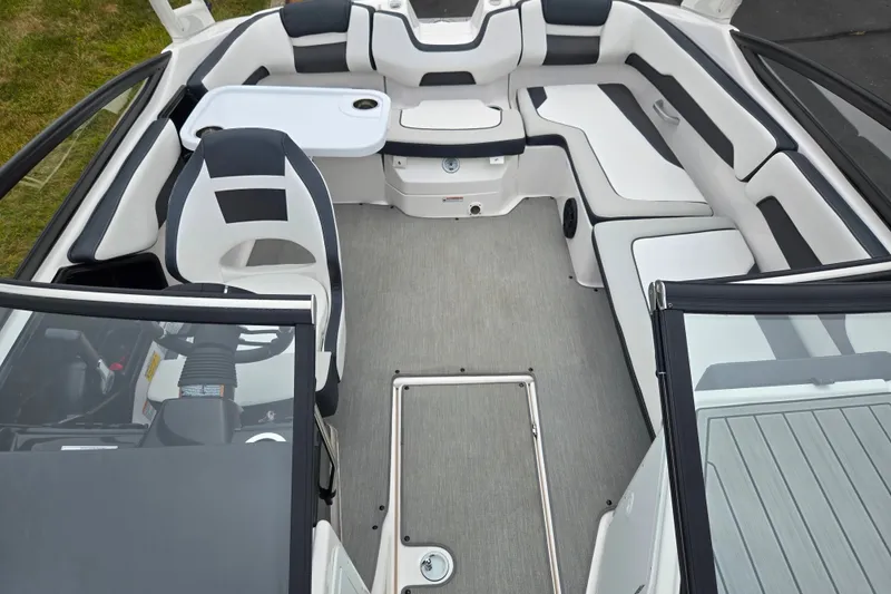 Slide: The Image of 2023 Yamaha Boats AR195 interior with sleek seating and modern design. - 22