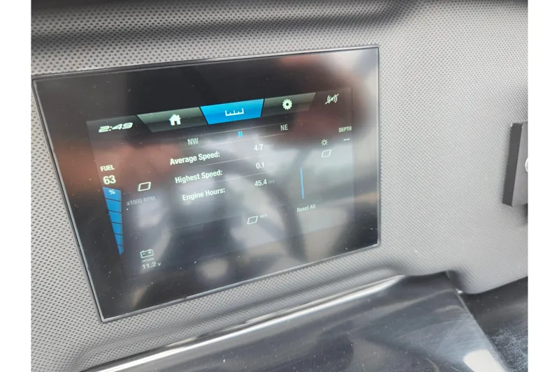 Slide: The Image of Dashboard display of 2023 Yamaha Boats AR195 showing speed, fuel, and engine hours. - 26