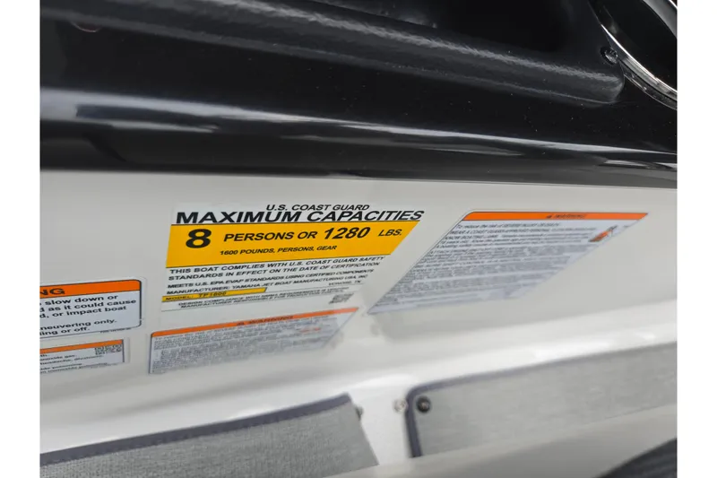 Slide: The Image of 2023 Yamaha AR195 boat capacity label, maximum 8 persons or 1280 lbs. - 14