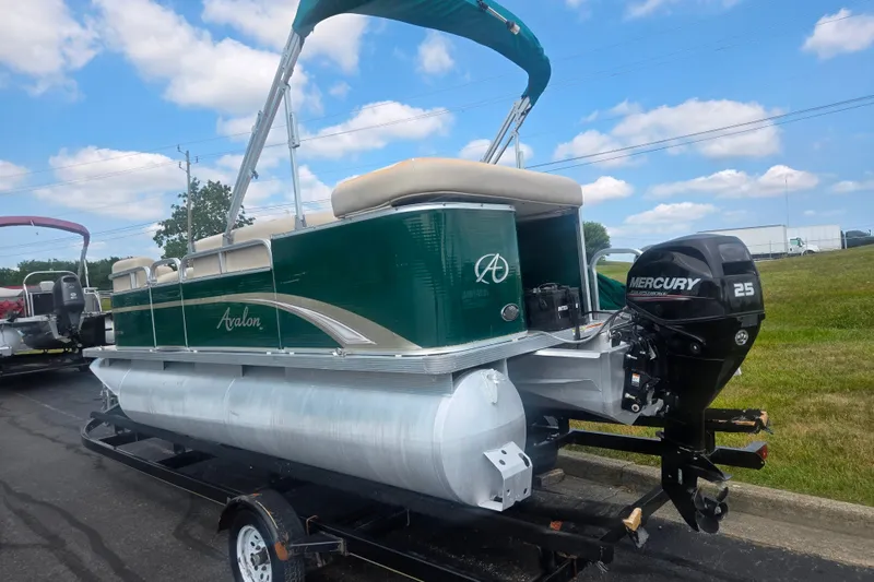 Slide: The Image of 2012 Avalon A Fish 16' pontoon boat with Mercury 25 engine on trailer. - 3