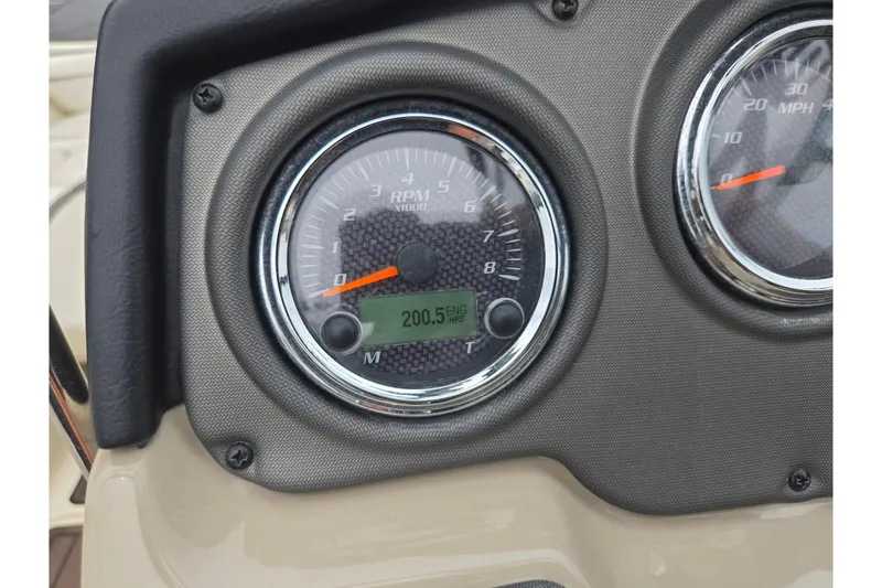 Slide: The Image of Close-up of 2014 Yamaha Boats 242 Limited S RPM gauge displaying 200.5 engine hours. - 23