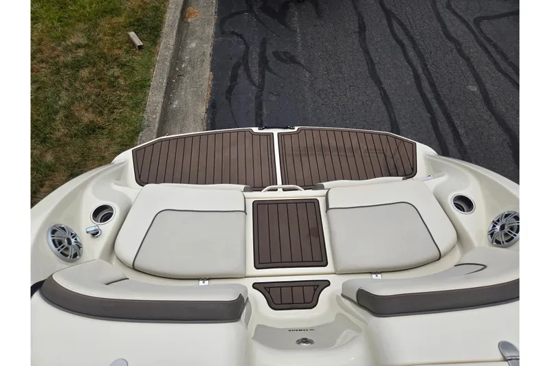 Slide: The Image of 2014 Yamaha Boats 242 Limited S swim platform with cushioned seating and speakers. - 25