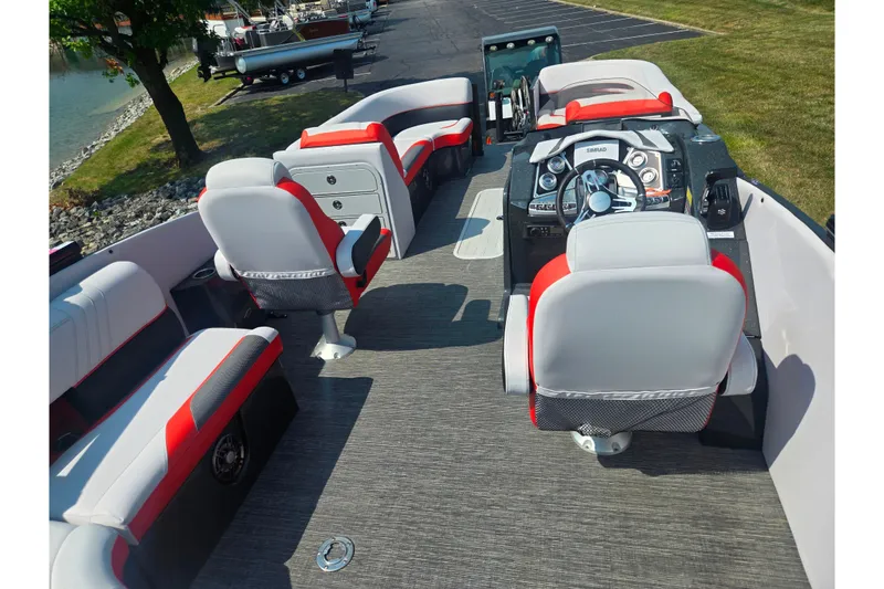 Slide: The Image of 2023 Crest Caribbean RS 230 boat interior with modern seating and control panel. - 11