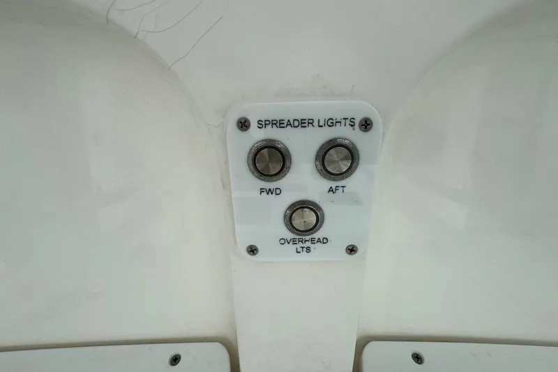 Slide: The Image of Control panel for spreader lights on a 2015 Sea Hunt Ultra 235SE boat. - 23