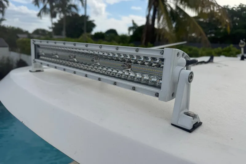 Slide: The Image of LED light bar on 2015 Sea Hunt Ultra 235SE boat, with tropical background. - 49