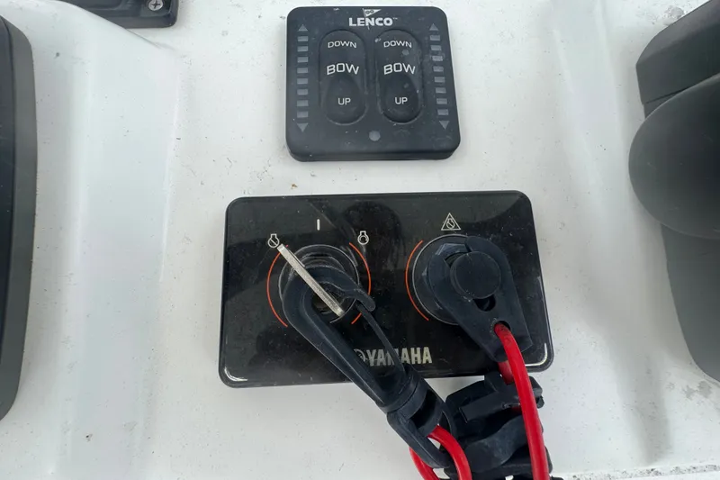 Slide: The Image of Control panel of a 2015 Sea Hunt Ultra 235SE boat with Yamaha ignition. - 22