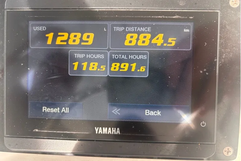 Slide: The Image of Yamaha display showing fuel usage, trip distance, and hours for 2015 Sea Hunt Ultra 235SE. - 53
