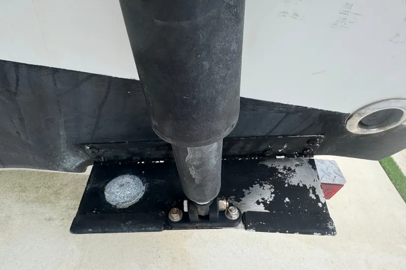 Slide: The Image of Close-up of a 2015 Sea Hunt Ultra 235SE boat component, showing wear and metal fittings. - 45