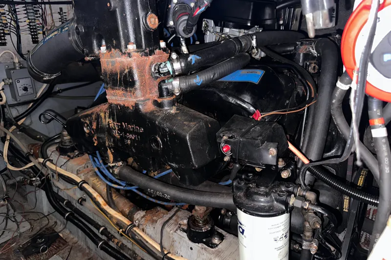 Slide: The Image of Engine compartment of 1984 Chris-Craft 381 Catalina with visible components and wiring. - 36
