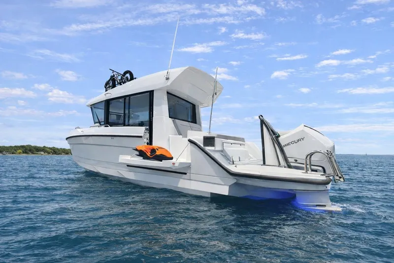 Slide: The Image of 2026 Cruisers Yachts 38 VTR on open water, featuring sleek design and modern amenities. - 2