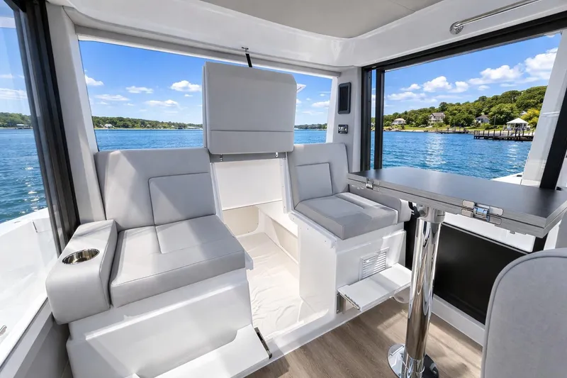 Slide: The Image of Luxurious interior of 2026 Cruisers Yachts 38 VTR with scenic water view. - 5