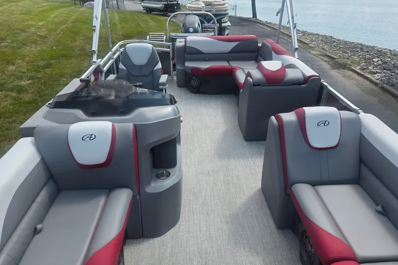 Slide: The Image of 2024 Avalon LSZ Cruise Bench pontoon boat with luxurious seating and modern design. - 11