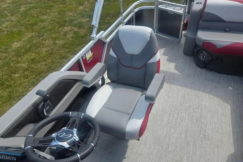 Slide: The Image of 2024 Avalon LSZ Cruise Bench boat interior with steering wheel and seating. - 13