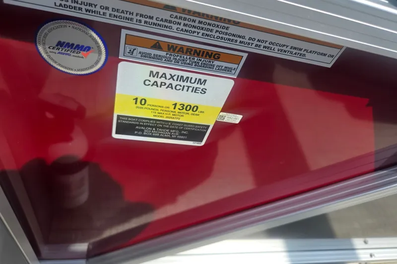 Slide: The Image of 2024 Avalon LSZ Cruise Bench capacity label, indicating maximum 10 persons or 1300 lbs. - 20