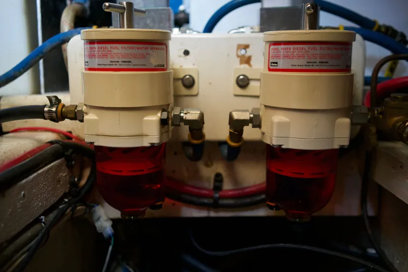 Slide: The Image of Dual diesel fuel filters in a 1978 DeFever 39 engine room. - 23