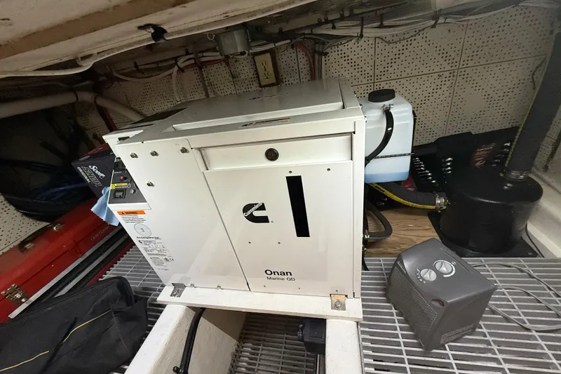 Slide: The Image of Onan Marine QD generator in 1978 DeFever 39 engine room. - 2